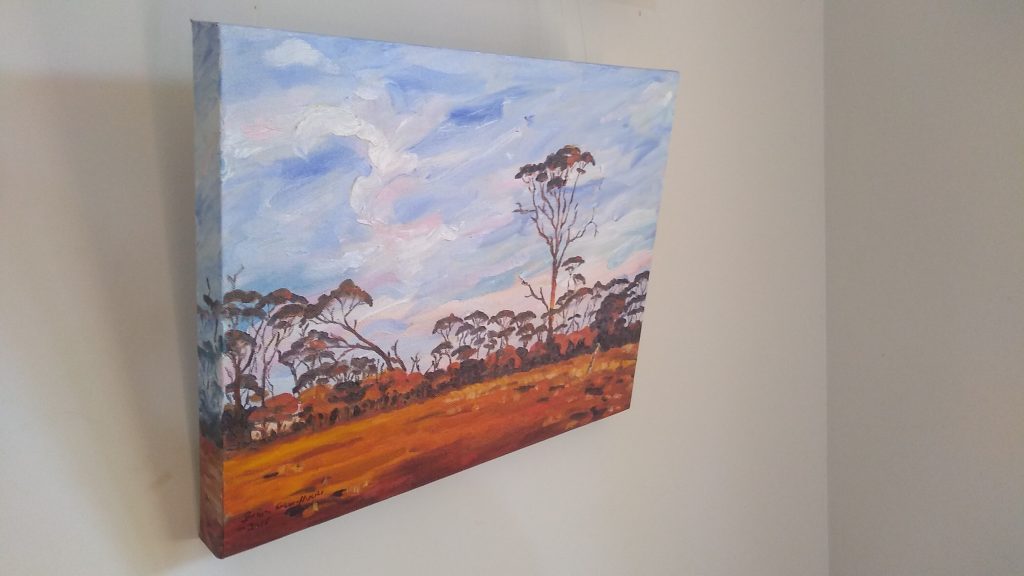 Left view of art original oil painting RAM PADDOCK AT SUNRISE a wheatbelt landscape of red sunrise reflecting off three stories of tree line set in the Western Australian Wheatbelt near Merredin an original oil painting by Brian Carew-Hopkins on VooGlue