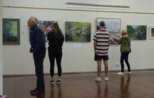 Visitors at Holy Rosary Parsh Community Centre art display